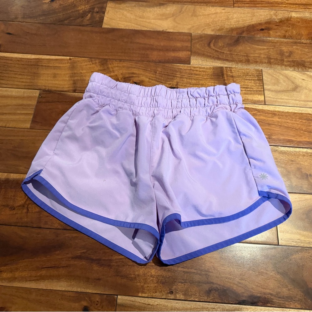 Athleta girl Purple Shorts size large lightly used